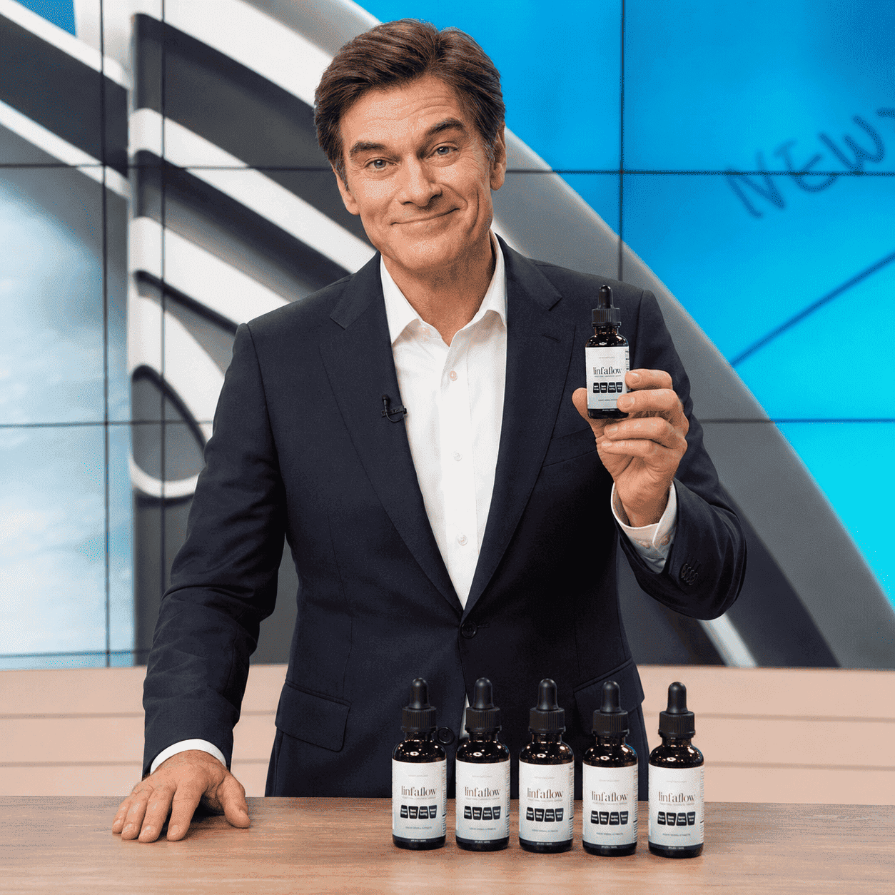 Health expert holding a Linfaflow bottle in a studio