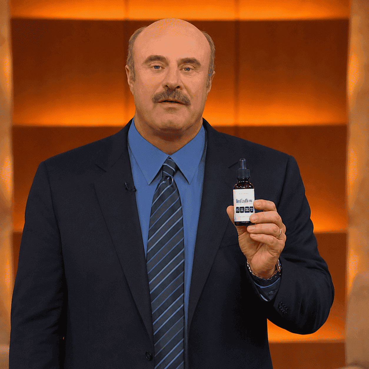 Television health presenter holding a Linfaflow bottle